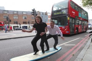 Briffa team having fun on a surf board